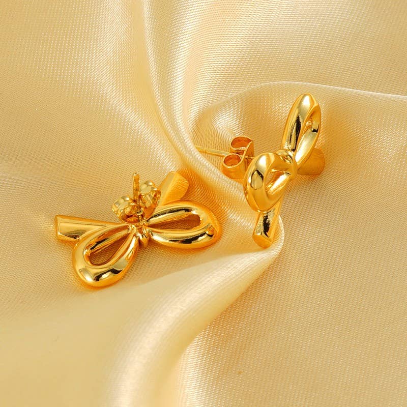 
                  
                    Gold Bow Studs
                  
                