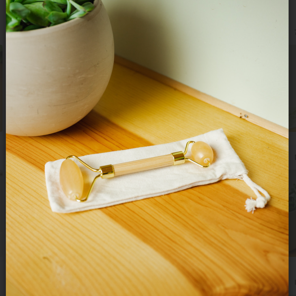 
                  
                    Stone + Bamboo Facial Massage Roller
                  
                