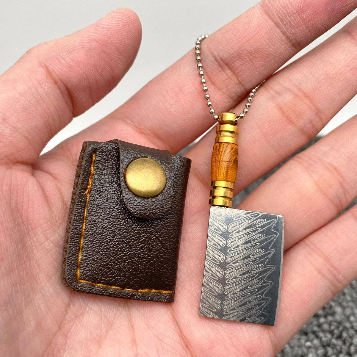 
                  
                    Most Mini Damascus Pocket Knife With Protective Sheath
                  
                