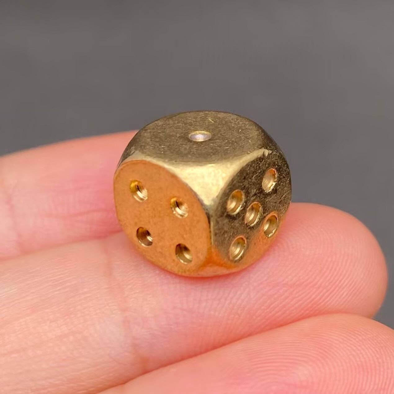 
                  
                    Brass Dice
                  
                