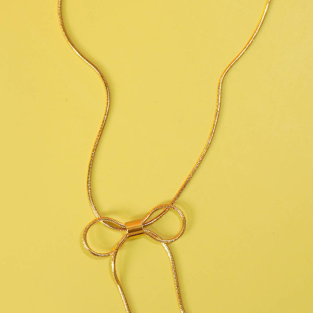 
                  
                    Gold Bow Cable Necklace
                  
                