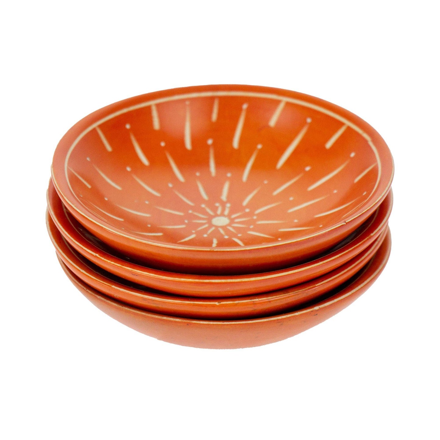 
                  
                    Stack of orange ceramic plates with white patterns on a white background
                  
                
