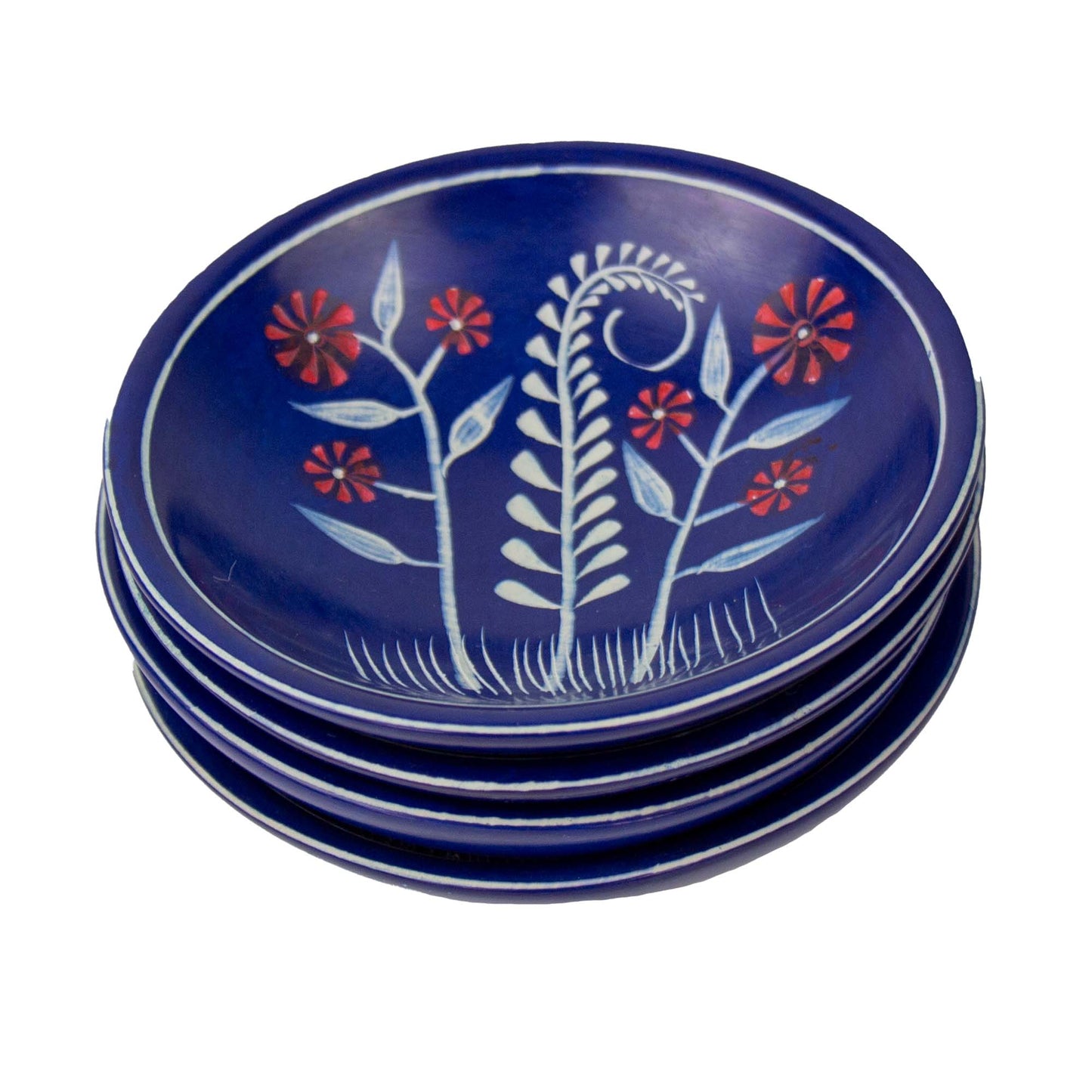 
                  
                    Set of four blue ceramic plates with floral designs on a white background
                  
                