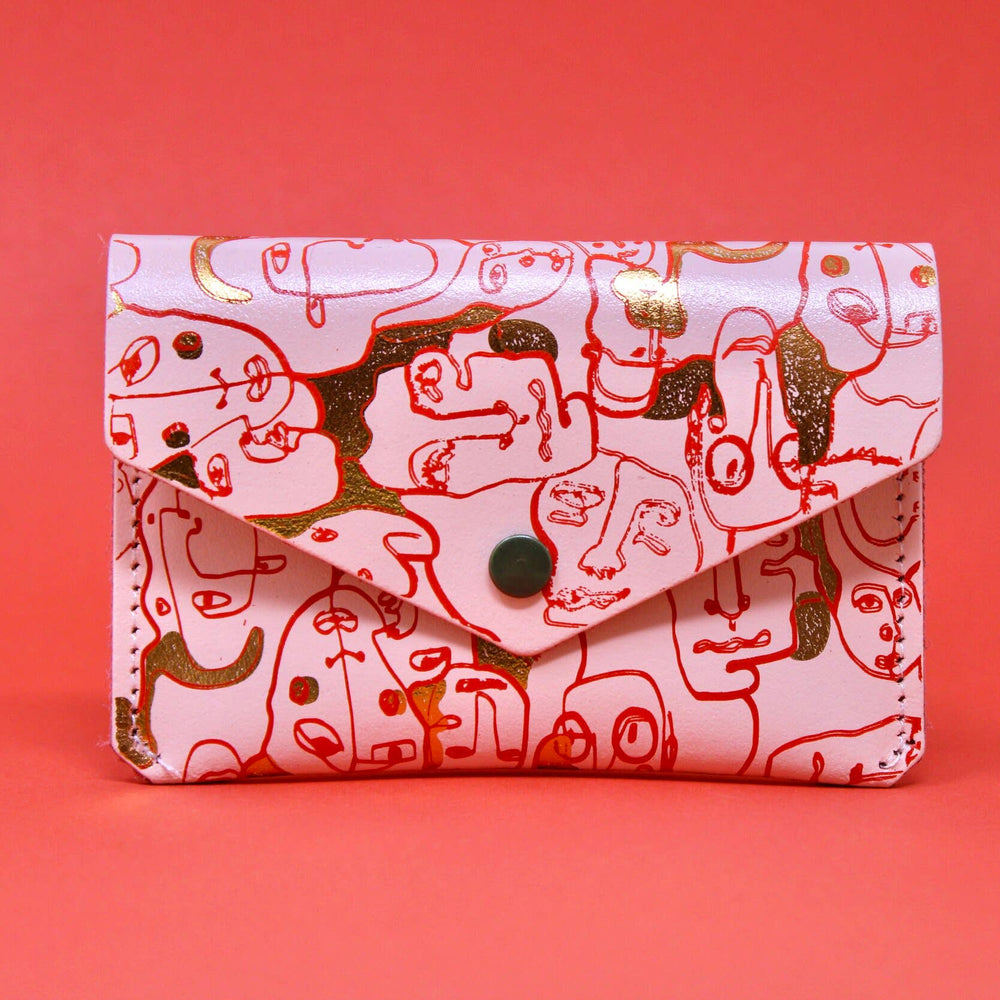 
                  
                    Many Faces Leather Popper Purse
                  
                