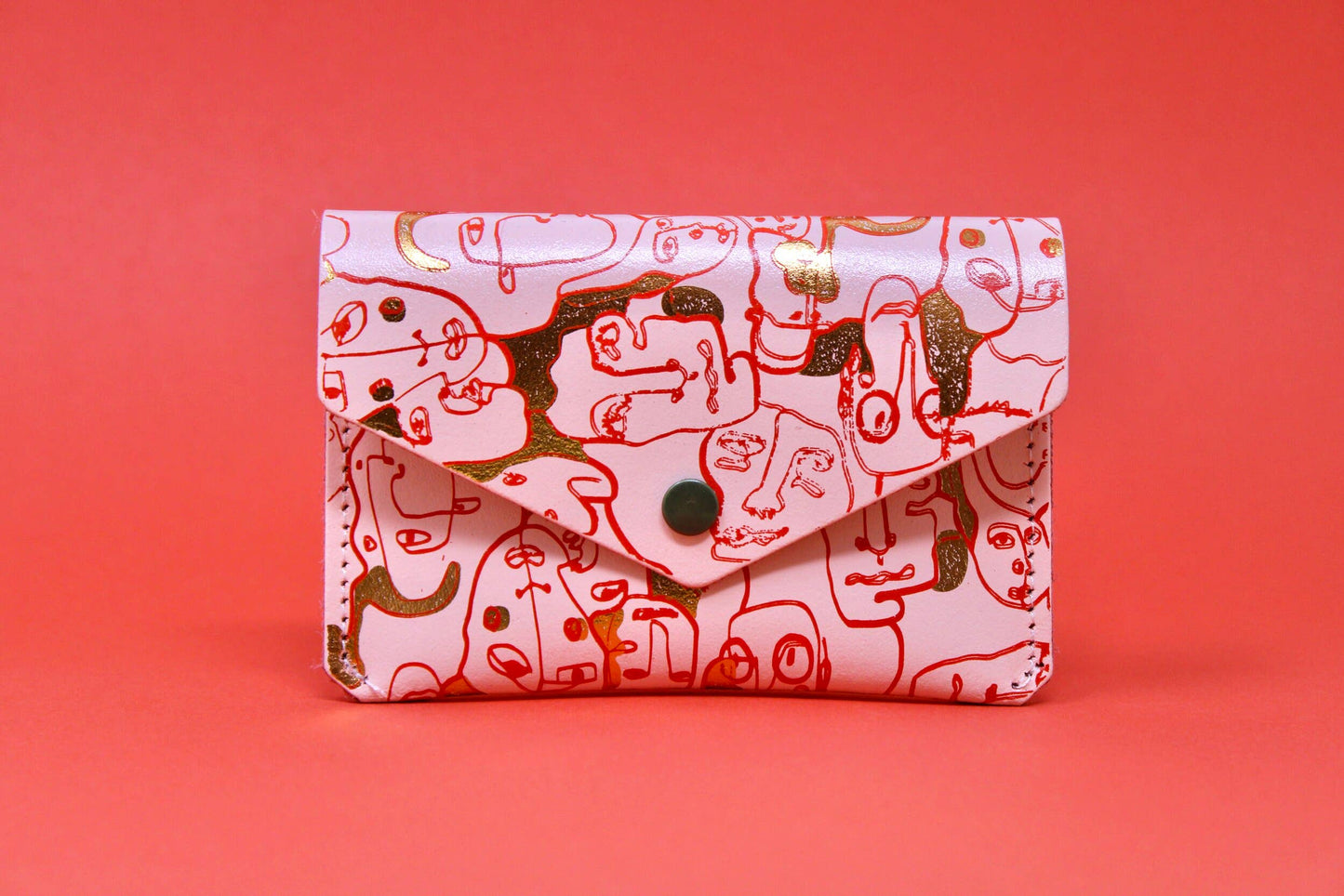 
                  
                    Many Faces Leather Popper Purse
                  
                