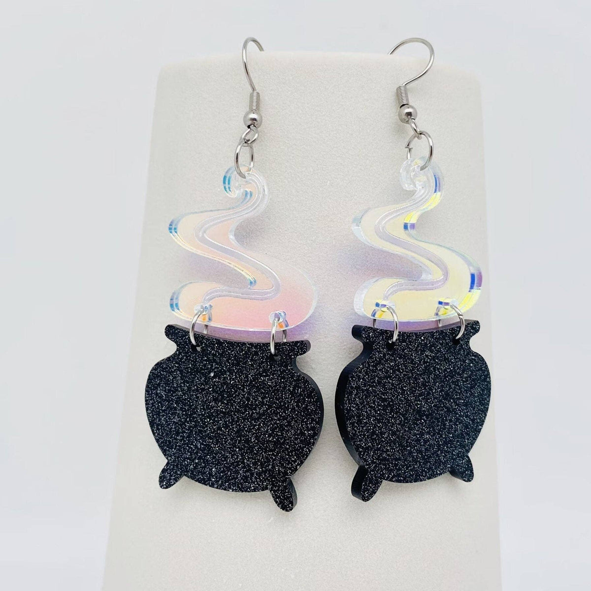 
                  
                    Iridescent Acrylic Cauldron Earrings
                  
                
