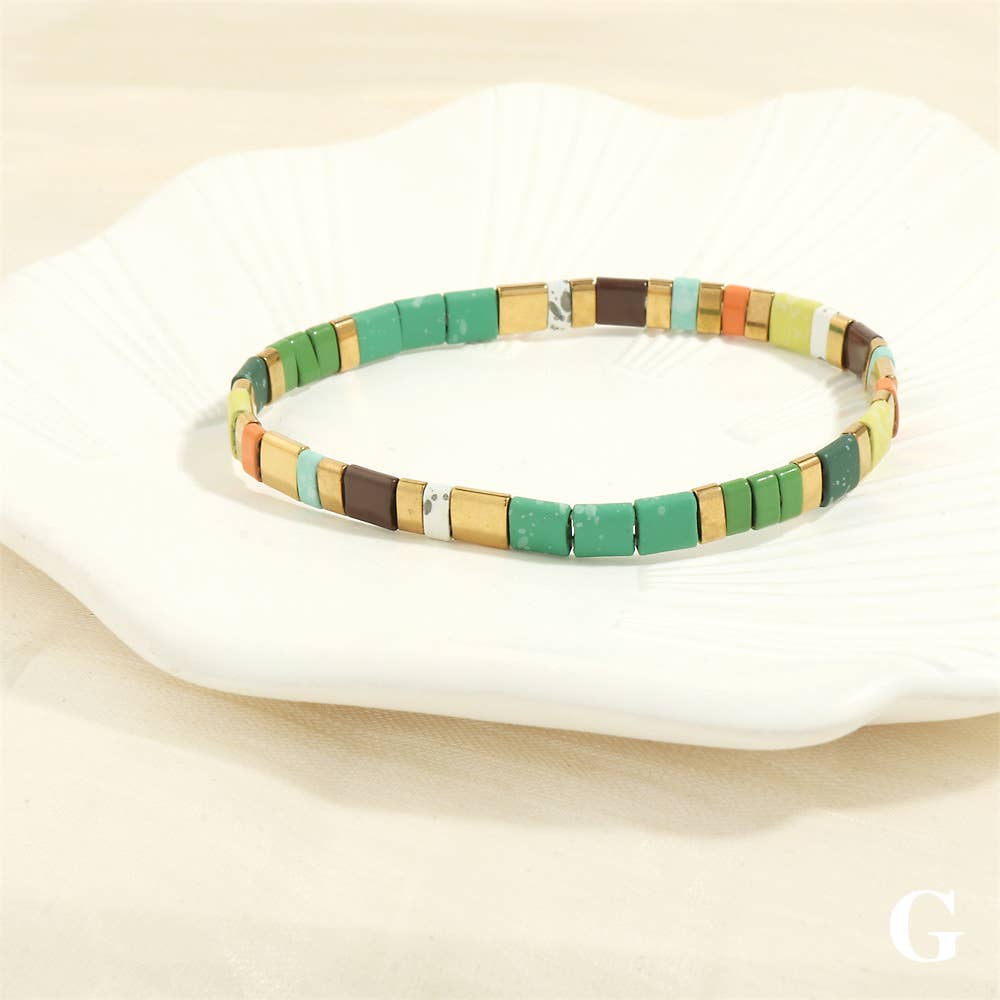 
                  
                    Glass TILA + Hematite Beaded Elastic Bracelets (Collection B)
                  
                