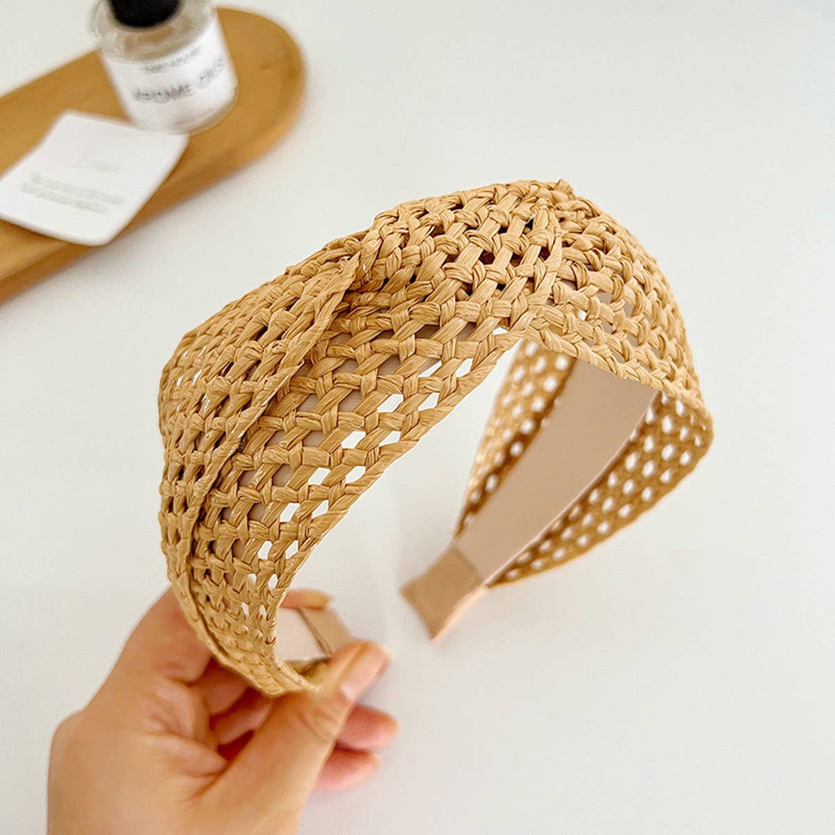
                  
                    Woven Twist Top Headband
                  
                