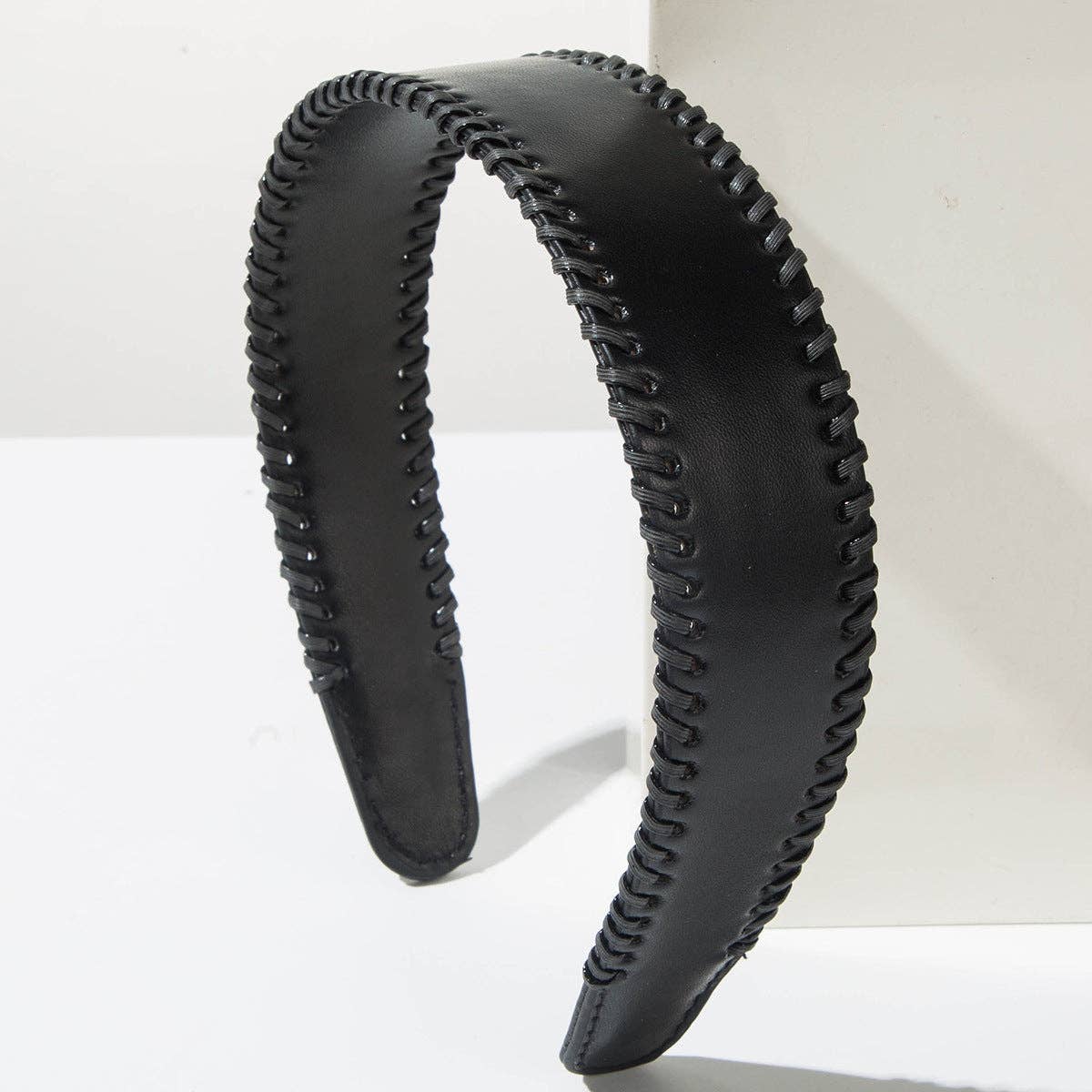 
                  
                    Wide Brim Leather Headband
                  
                