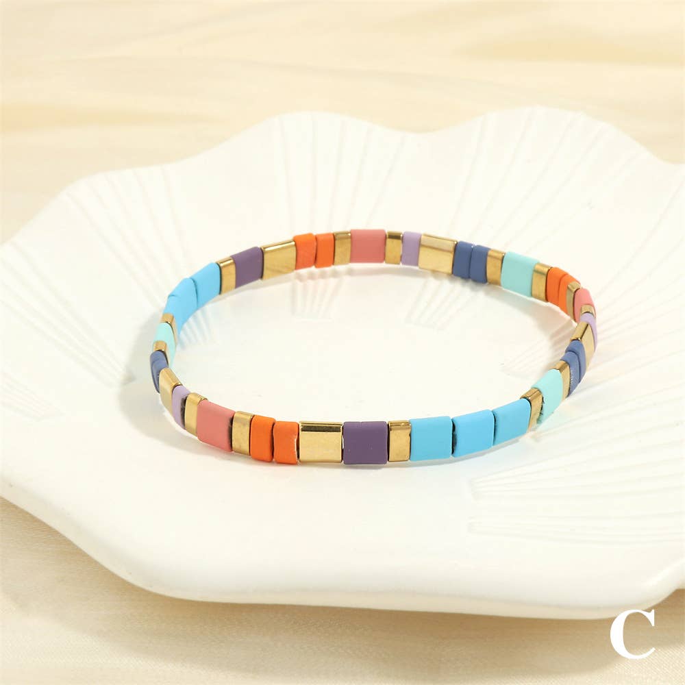 
                  
                    Glass TILA + Hematite Beaded Elastic Bracelets (Collection B)
                  
                