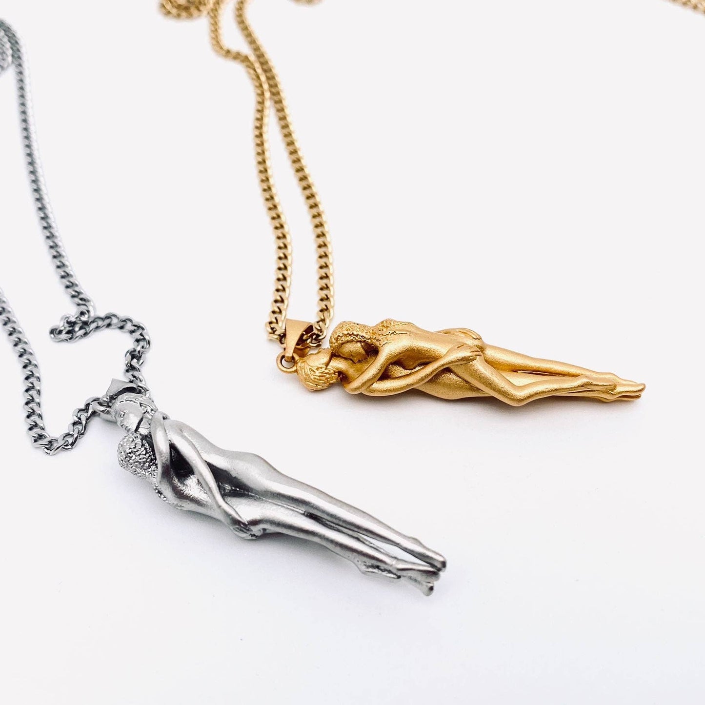 
                  
                    Embracing Lovers Charm Necklace
                  
                