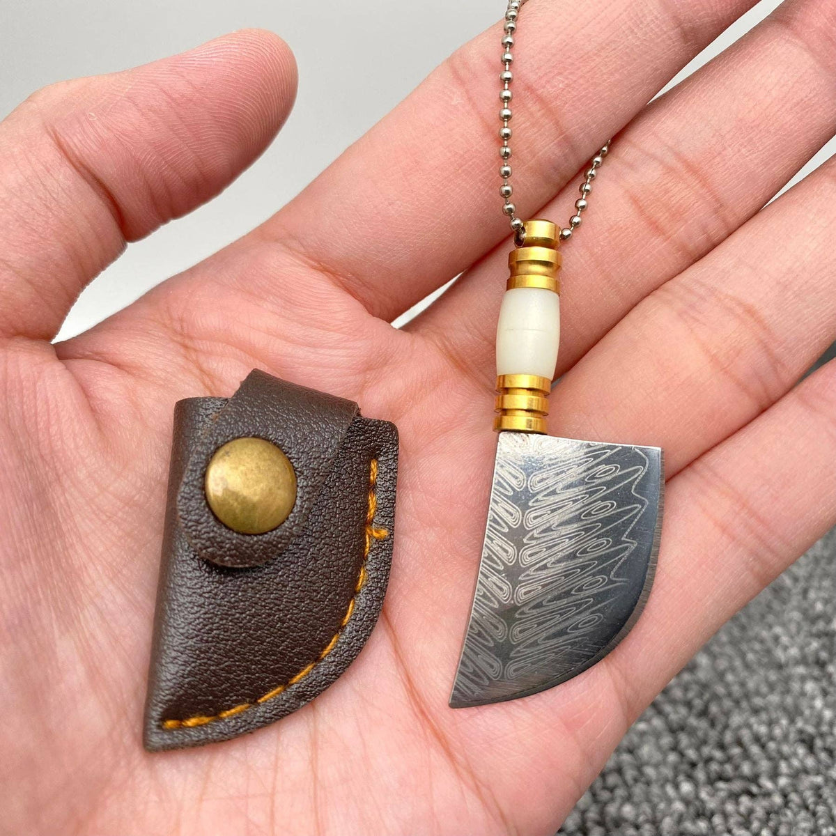 
                  
                    Most Mini Damascus Pocket Knife With Protective Sheath
                  
                