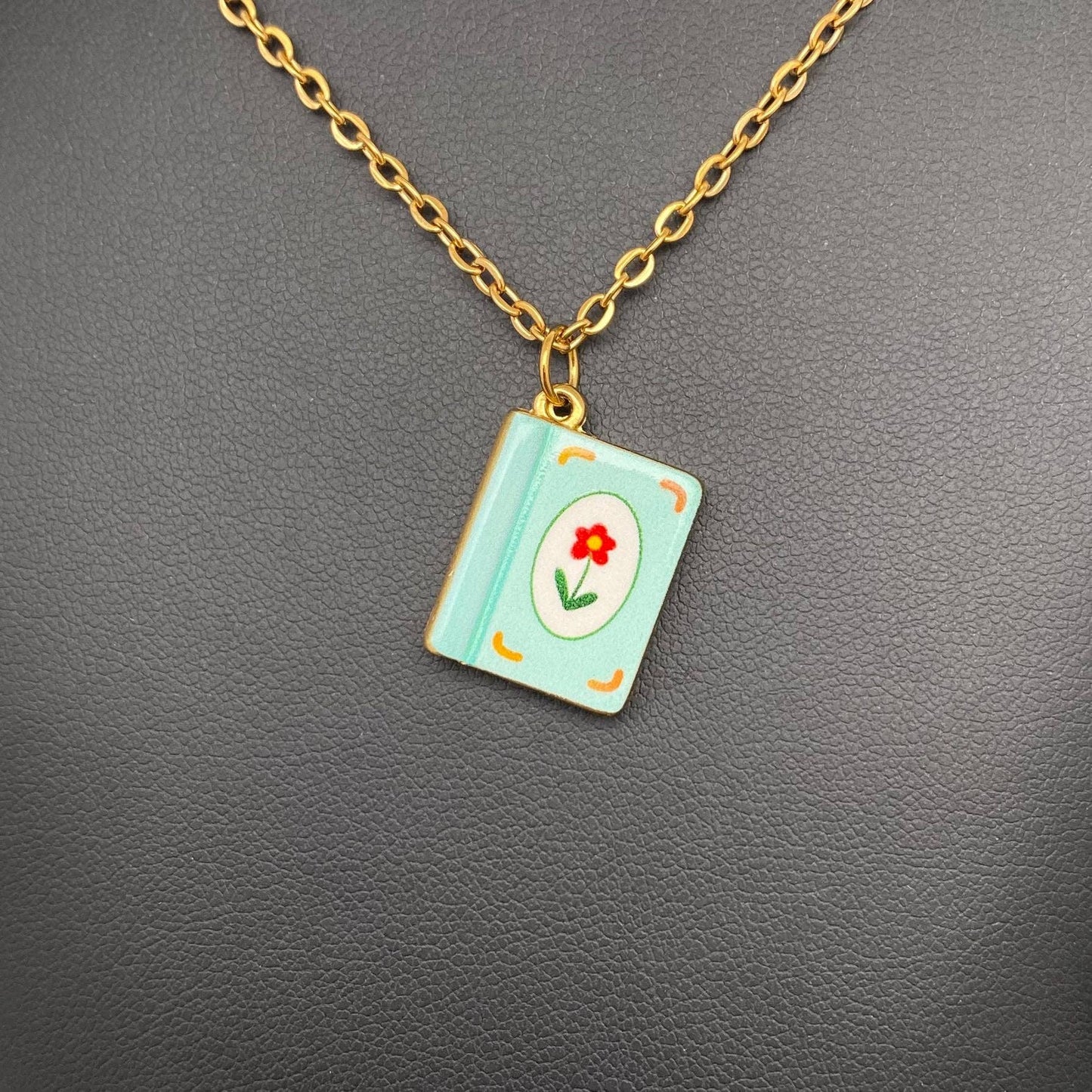 
                  
                    Enamel Book Charm Necklace
                  
                