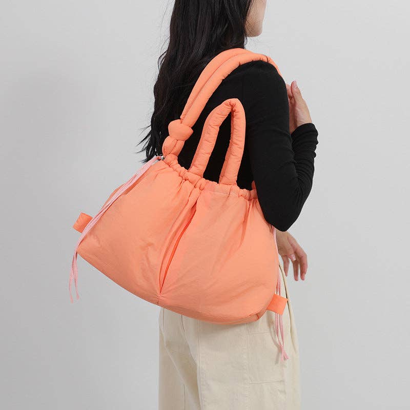 
                  
                    Convertible Large Capacity Nylon Puffer Backpack/Tote
                  
                