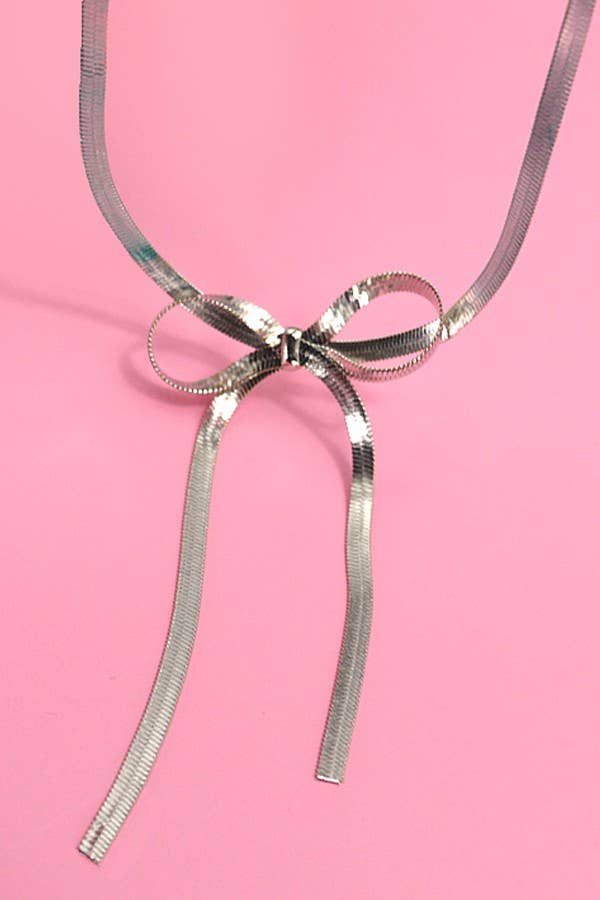 
                  
                    Silver Snake Chain Bow Necklace
                  
                