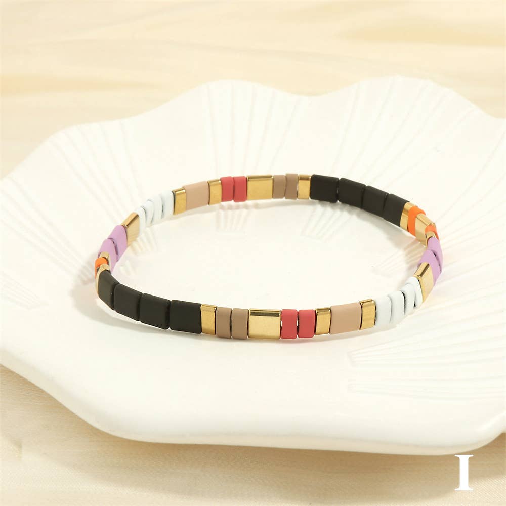 
                  
                    Glass TILA + Hematite Beaded Elastic Bracelets (Collection B)
                  
                
