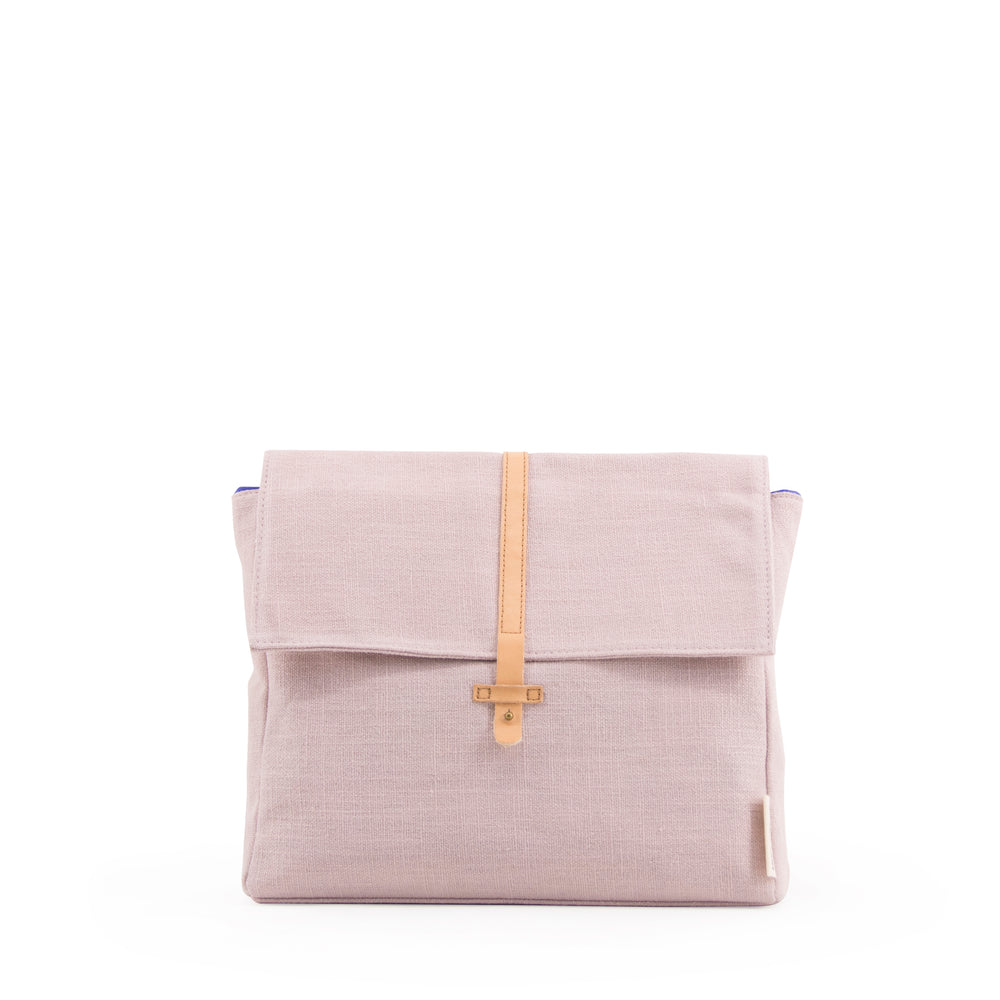 The best small messenger bag for kids made form canvas with a leather strap in nude color