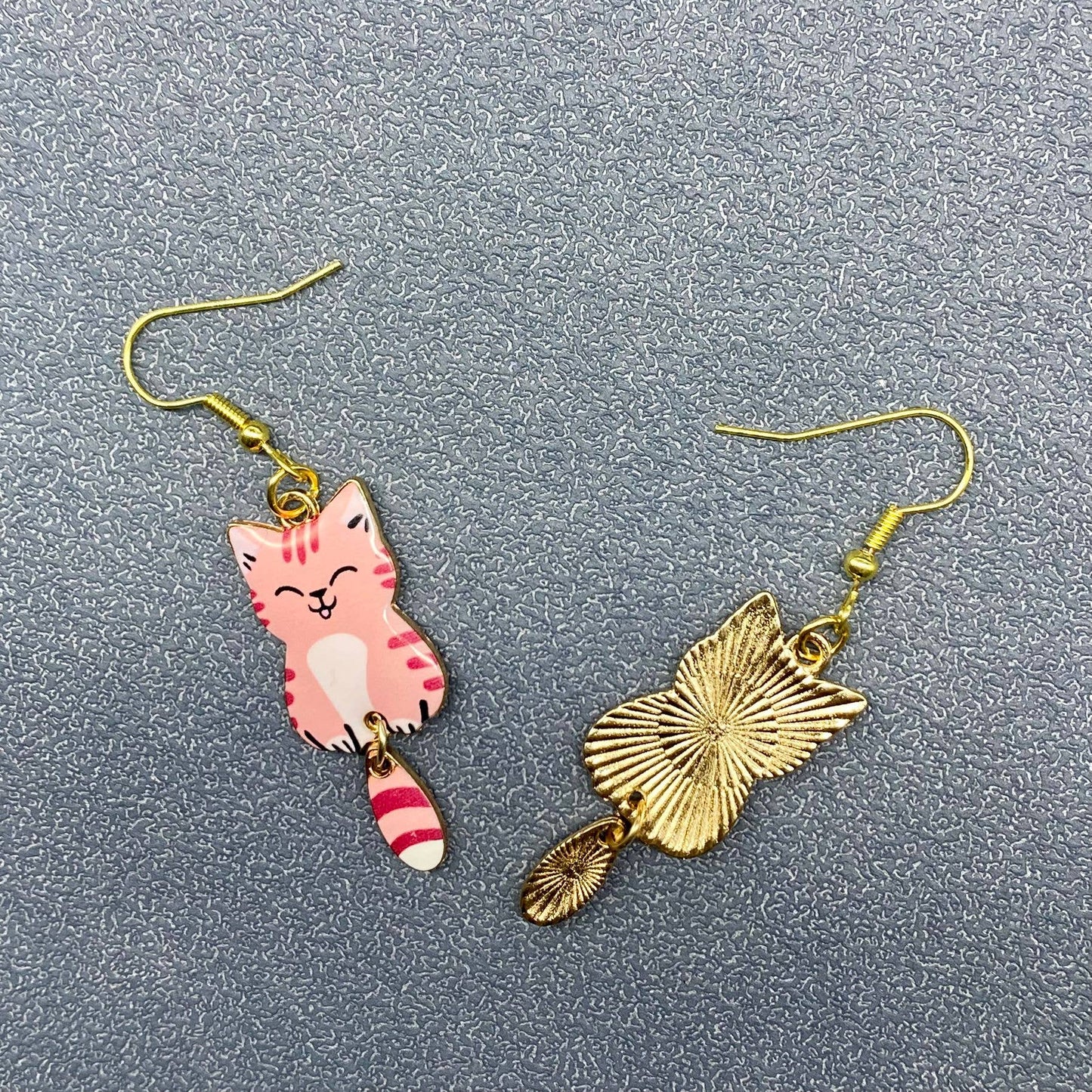 
                  
                    Swinging Tail Cat Earrings
                  
                