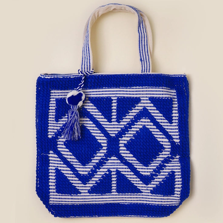 
                  
                    Woven Pom Pom Tassel Tote
                  
                