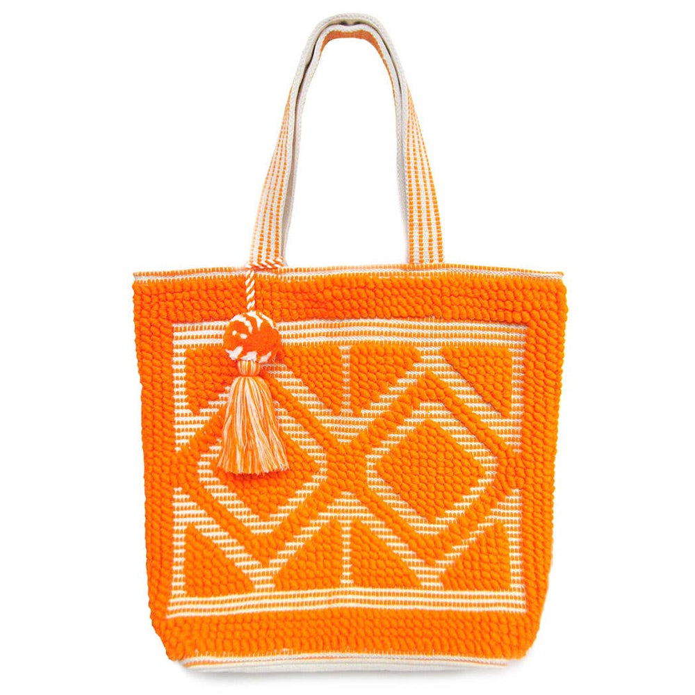 
                  
                    The boho woven pom pom tassel tote bag in orange
                  
                