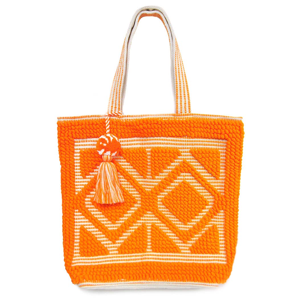 
                  
                    The boho woven pom pom tassel tote bag in orange
                  
                