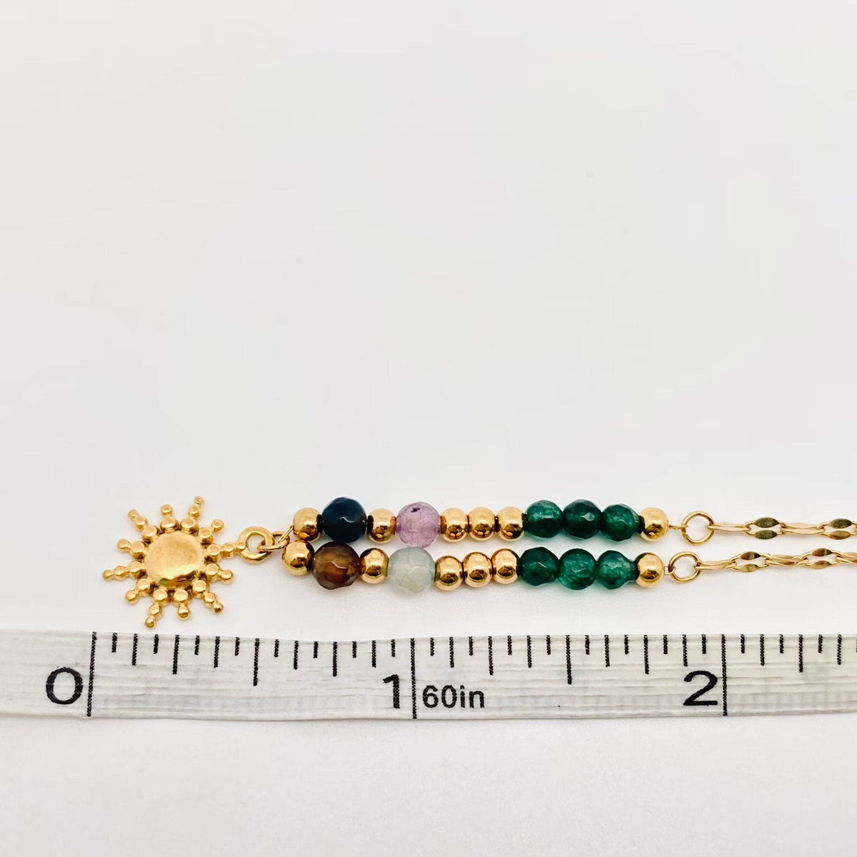
                  
                    Stone Beads and Sun Pendant Necklace
                  
                