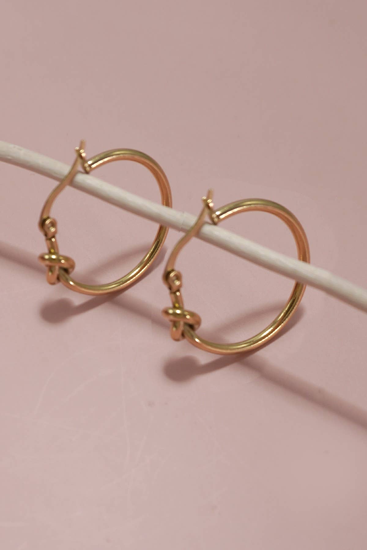 
                  
                    Gold Knot Cuff Earrings
                  
                