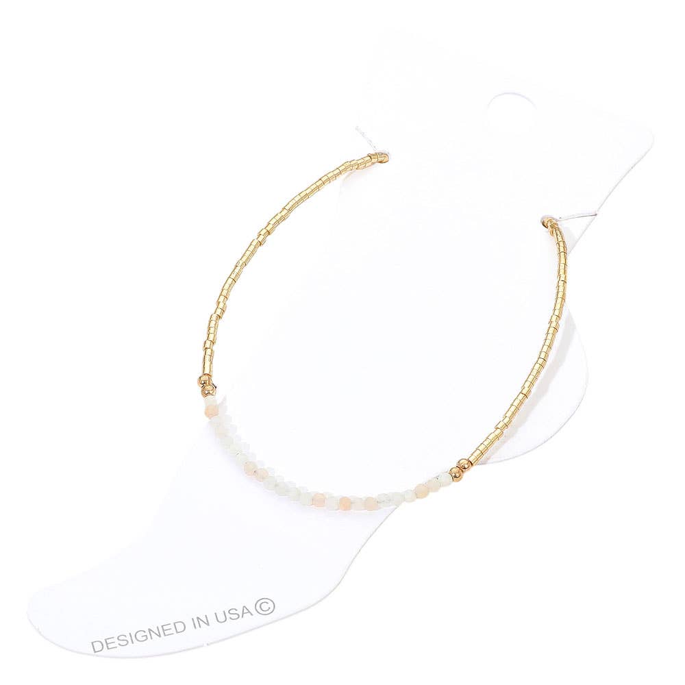 
                  
                    Gold + Peach Petite Beaded Anklet
                  
                