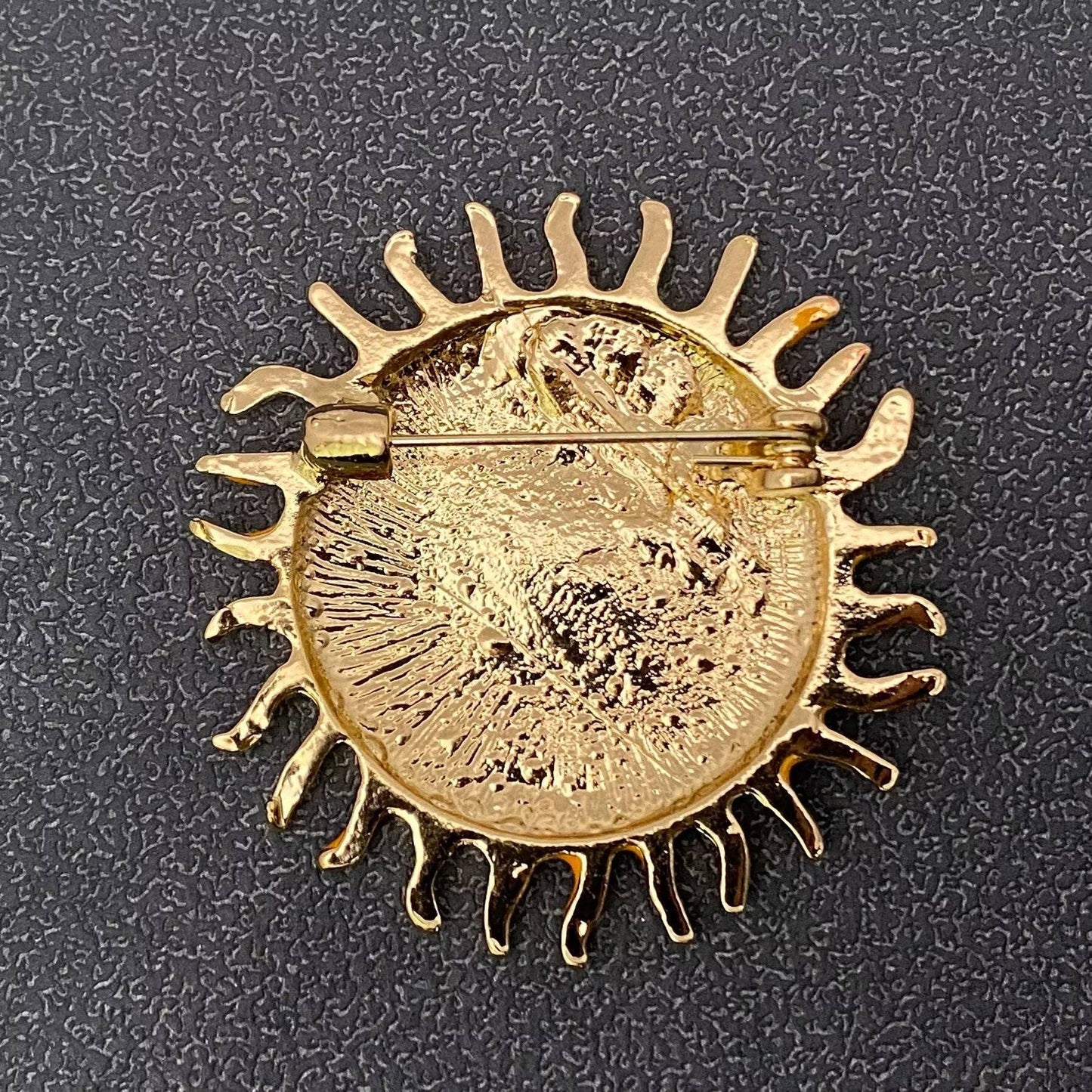 
                  
                    Enamel Artisan Sun Brooch
                  
                