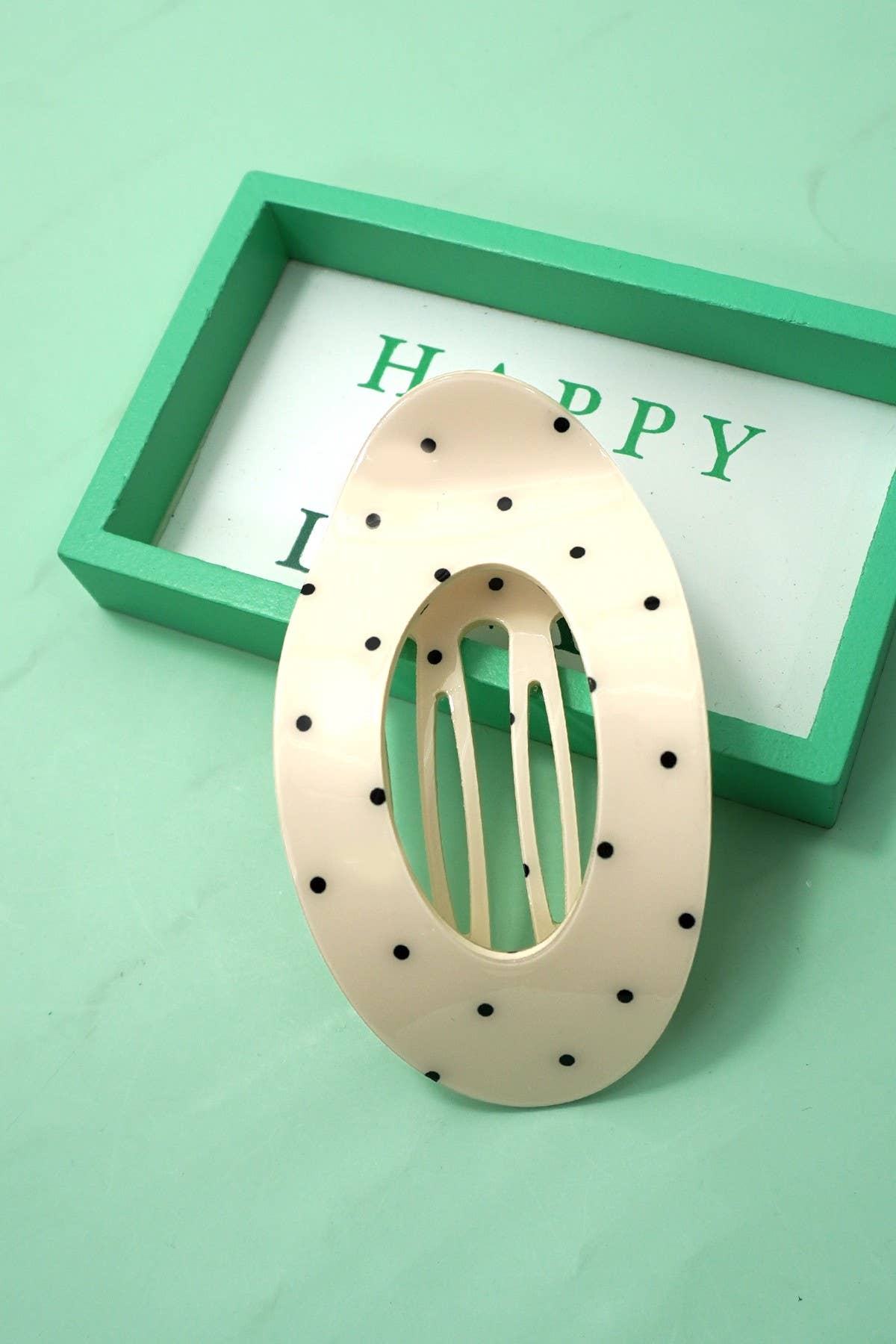 
                  
                    Dots Lay Flat Oval Hair Claw
                  
                