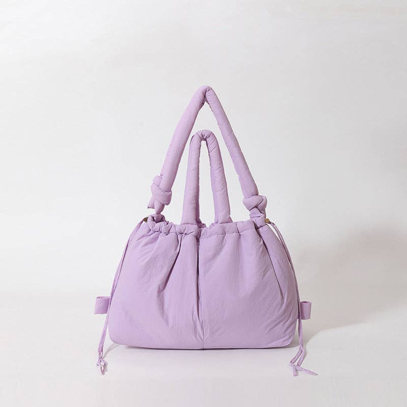 
                  
                    Convertible Large Capacity Nylon Puffer Backpack/Tote
                  
                