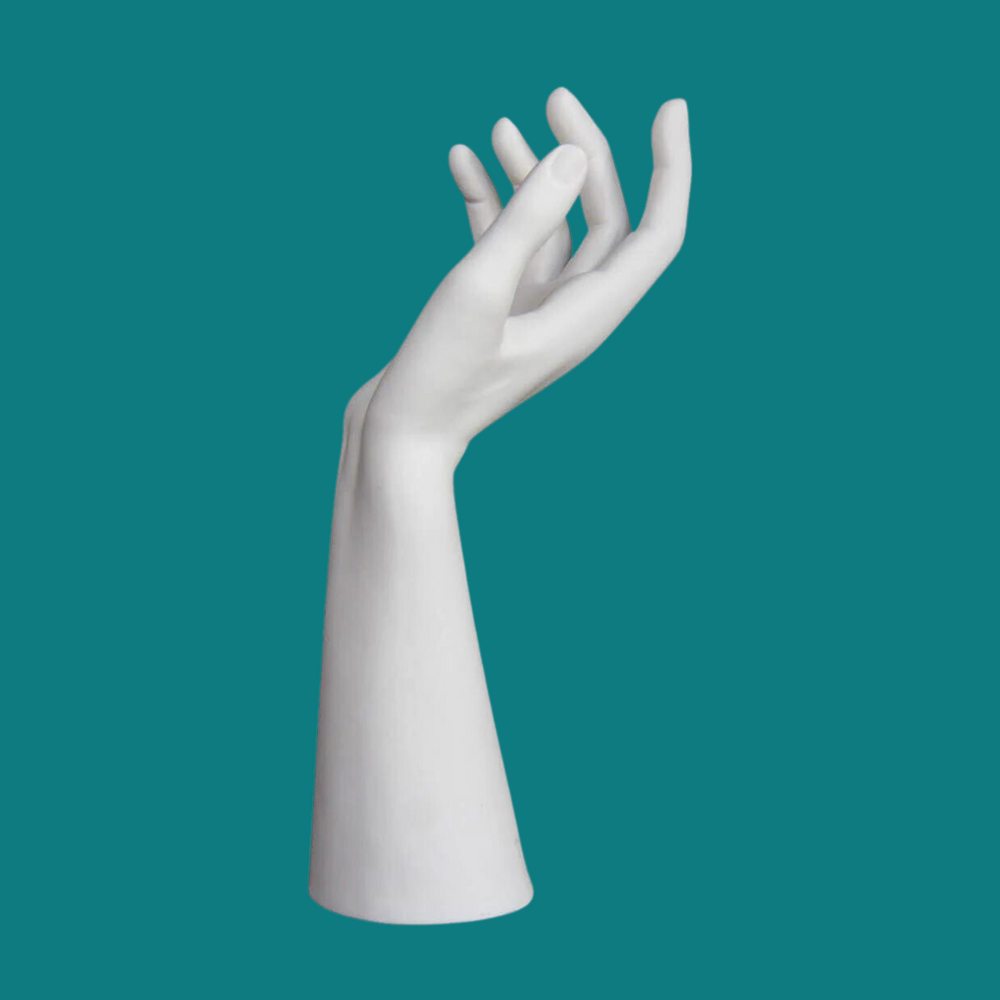 Tall ceramic jewelry holder in the shape of a hand reaching upward