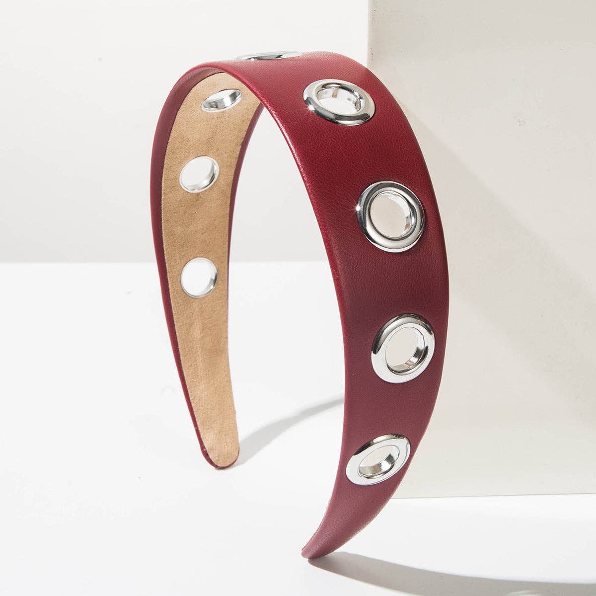 
                  
                    90s Metal Eyelets Headband
                  
                
