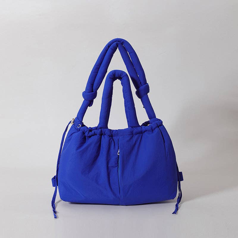
                  
                    Convertible Large Capacity Nylon Puffer Backpack/Tote
                  
                