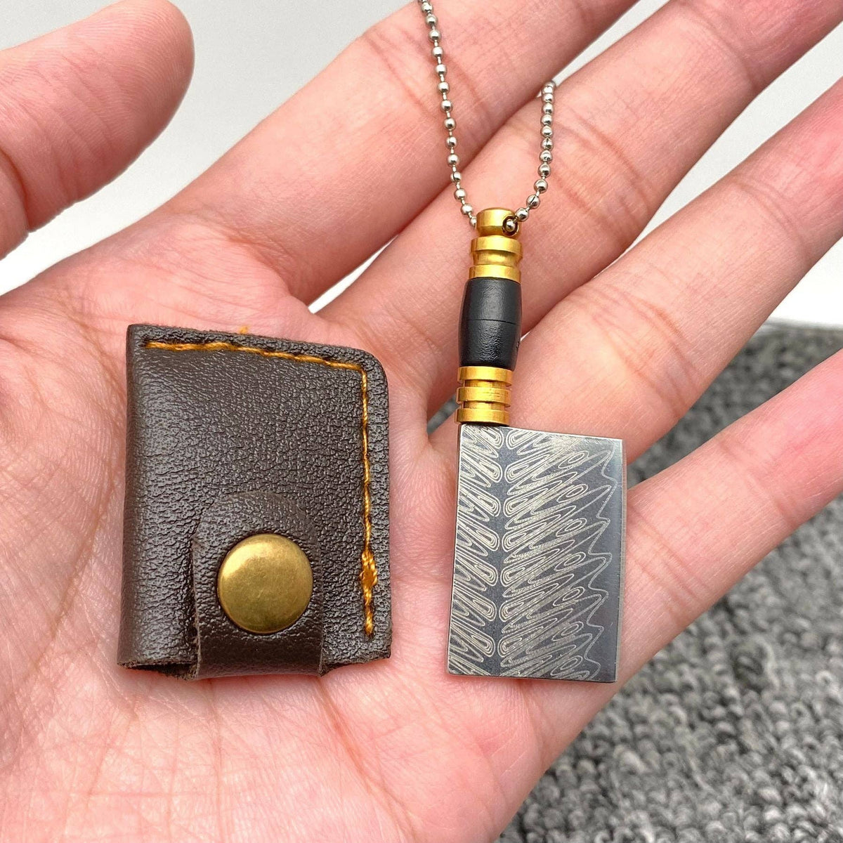 
                  
                    Most Mini Damascus Pocket Knife With Protective Sheath
                  
                