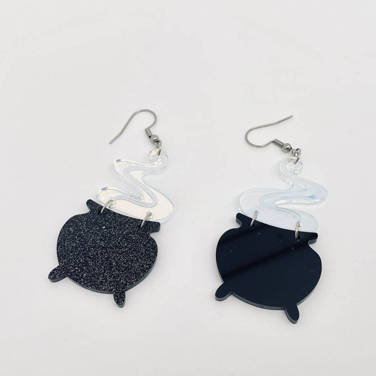 
                  
                    Iridescent Acrylic Cauldron Earrings
                  
                