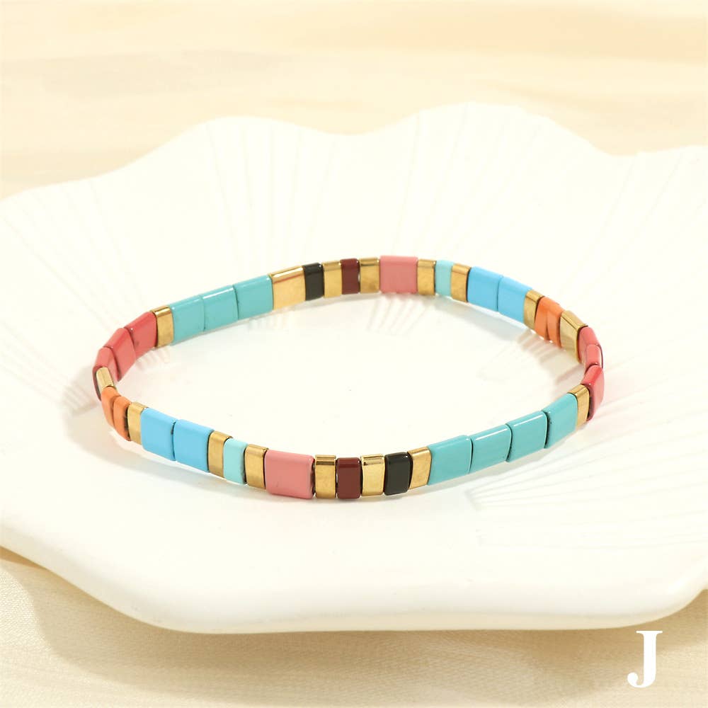 
                  
                    Glass TILA + Hematite Beaded Elastic Bracelets (Collection B)
                  
                