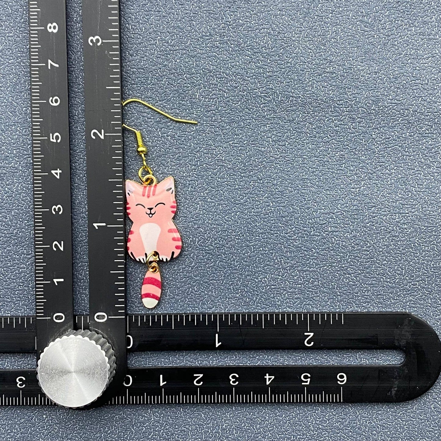 
                  
                    Swinging Tail Cat Earrings
                  
                
