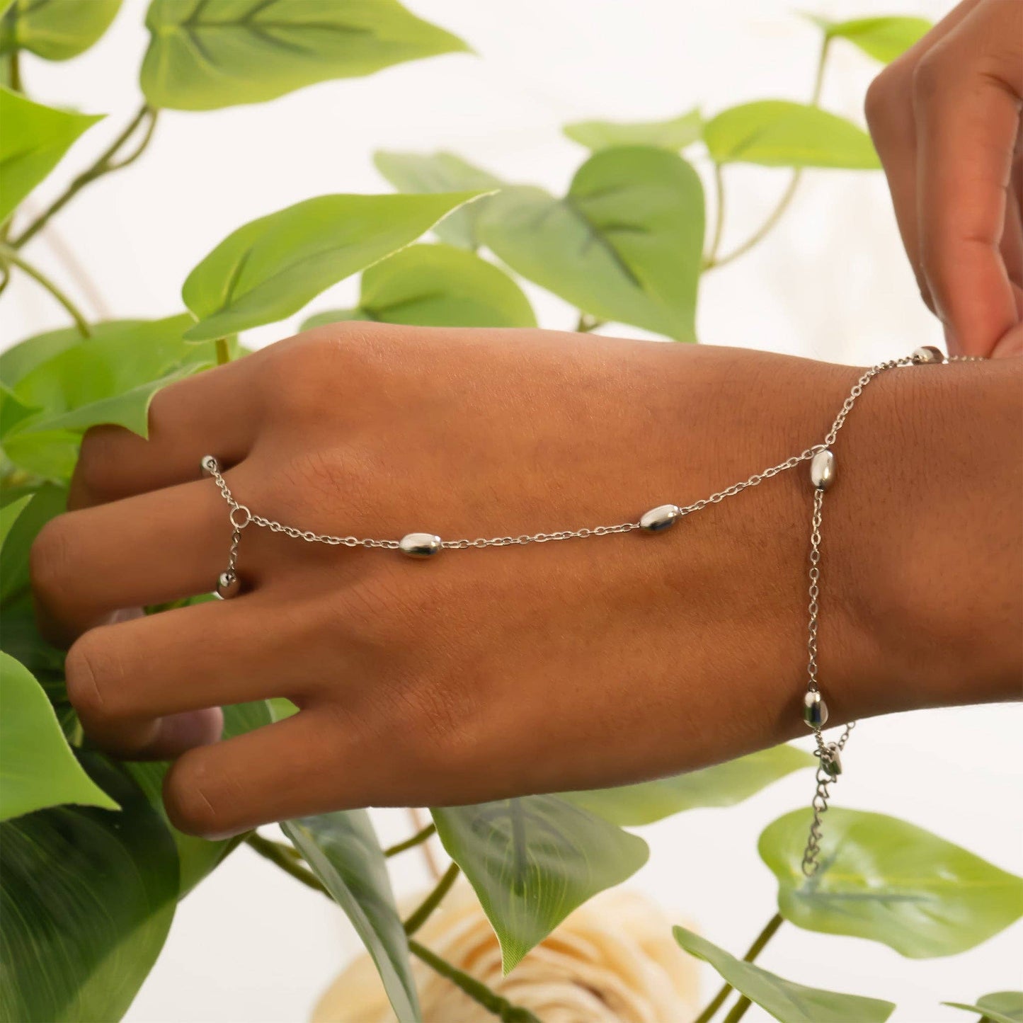 
                  
                    Oblong Beaded Hand Chain
                  
                