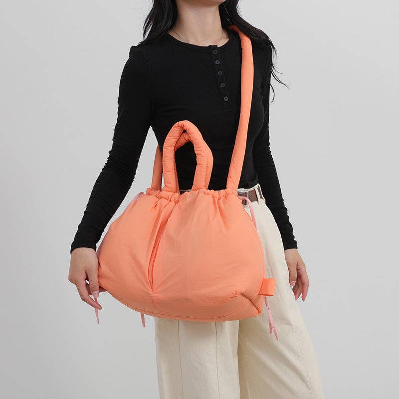 
                  
                    Convertible Large Capacity Nylon Puffer Backpack/Tote
                  
                
