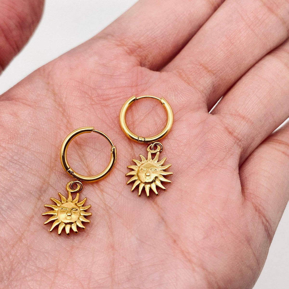 
                  
                    Sun Charm Huggies
                  
                