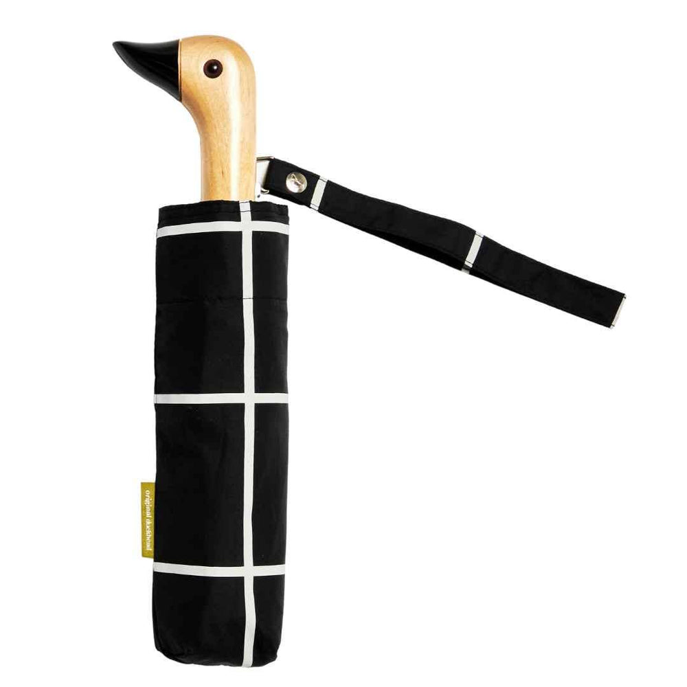 The original duckhead umbrella, with a hand-crafted wooden duck head handle and black grid umbrella pattern