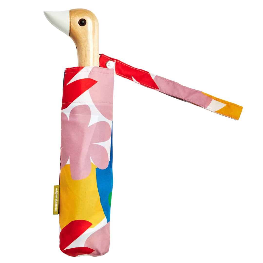 The original duckhead umbrella, with a hand-crafted wooden duck head and colorful umbrella