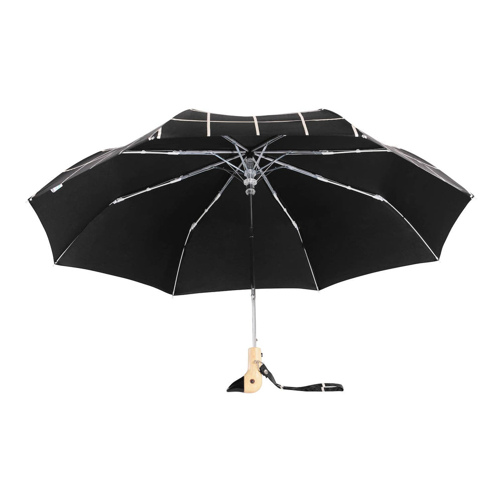 
                  
                    Side view of an opened duckhead umbrella in black grid pattern
                  
                