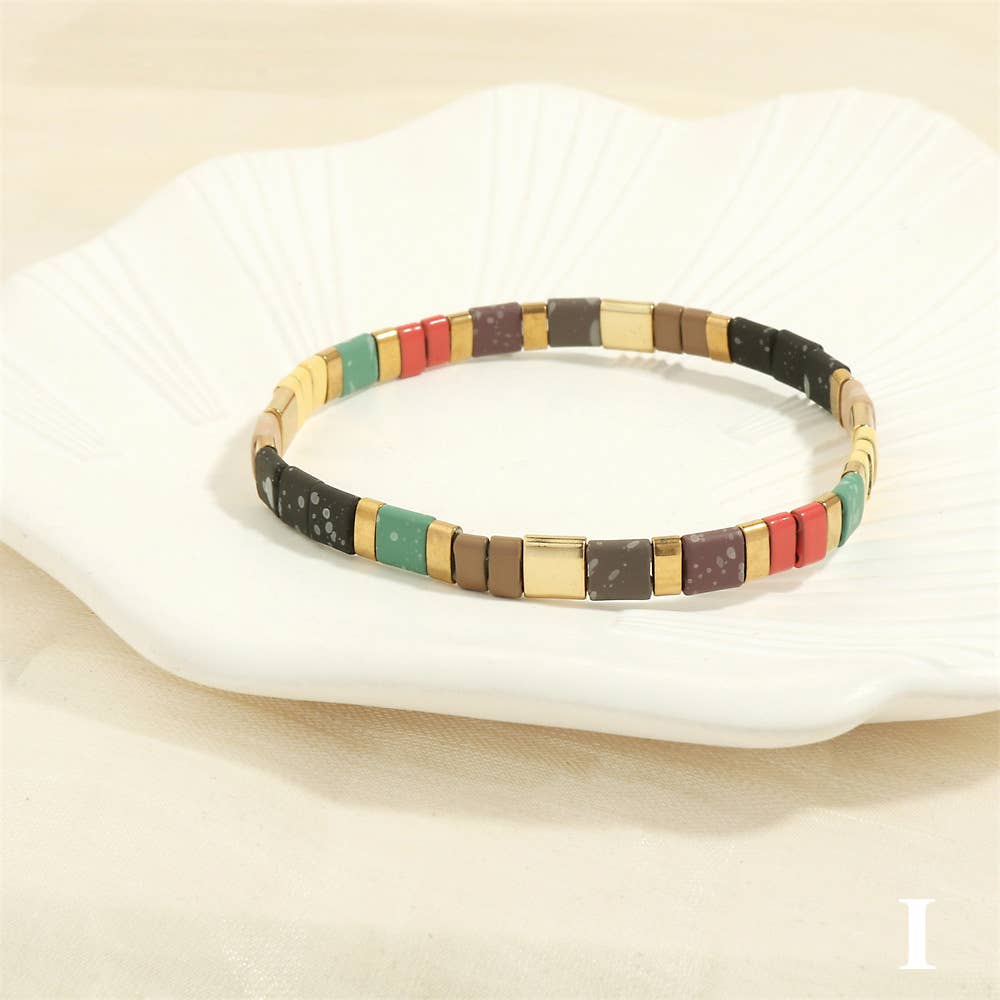 
                  
                    Glass TILA + Hematite Beaded Elastic Bracelets (Collection B)
                  
                