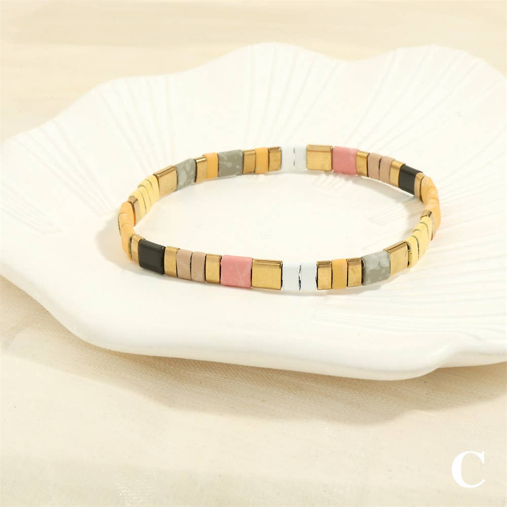 
                  
                    Glass TILA + Hematite Beaded Elastic Bracelets (Collection B)
                  
                