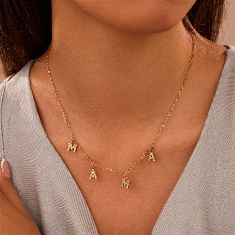
                  
                    M-A-M-A Studded Charms Necklace
                  
                