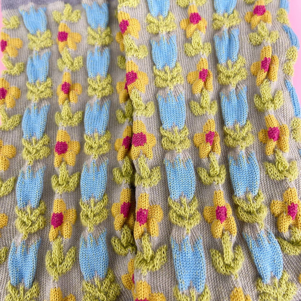 
                  
                    Embossed Florets Socks
                  
                