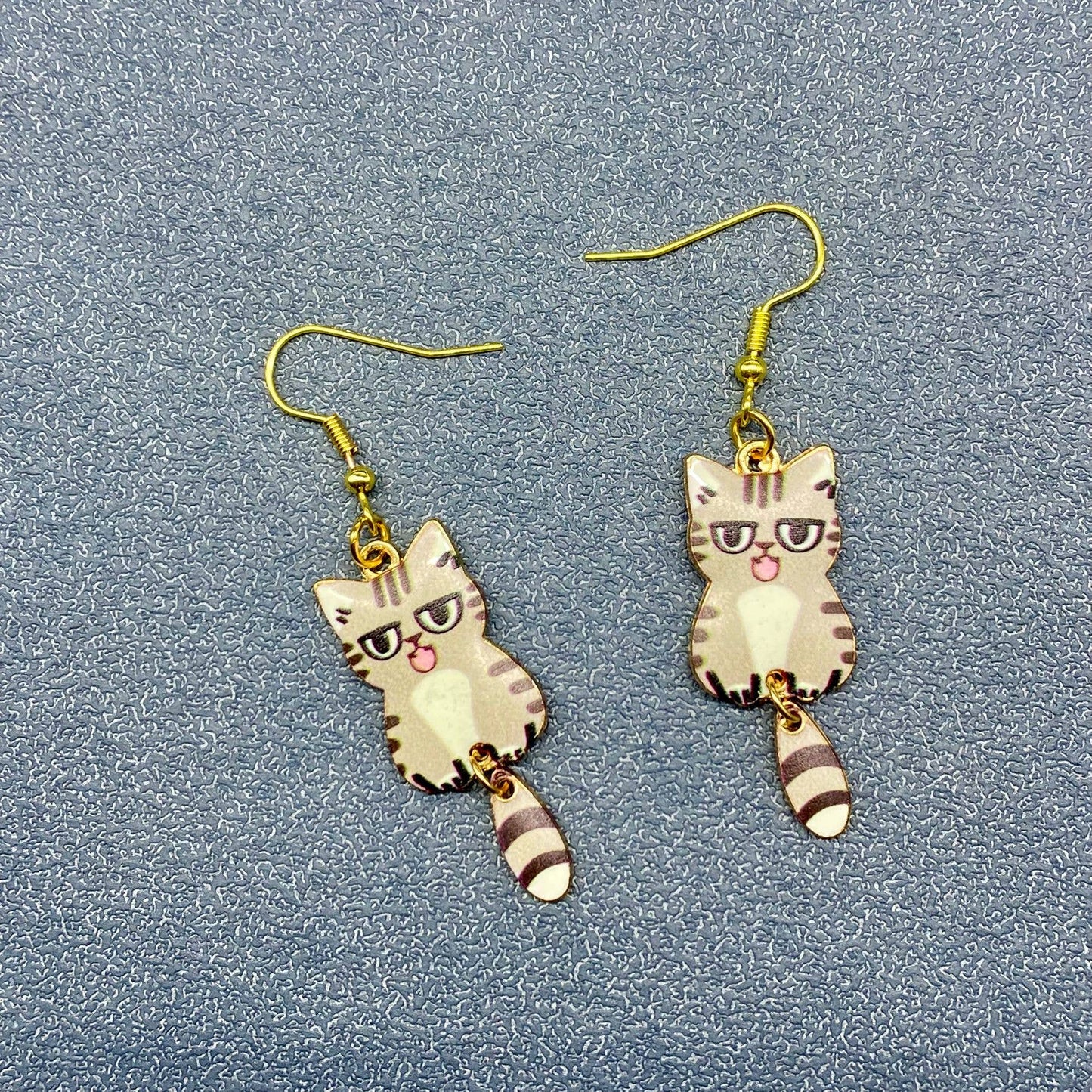
                  
                    Swinging Tail Cat Earrings
                  
                