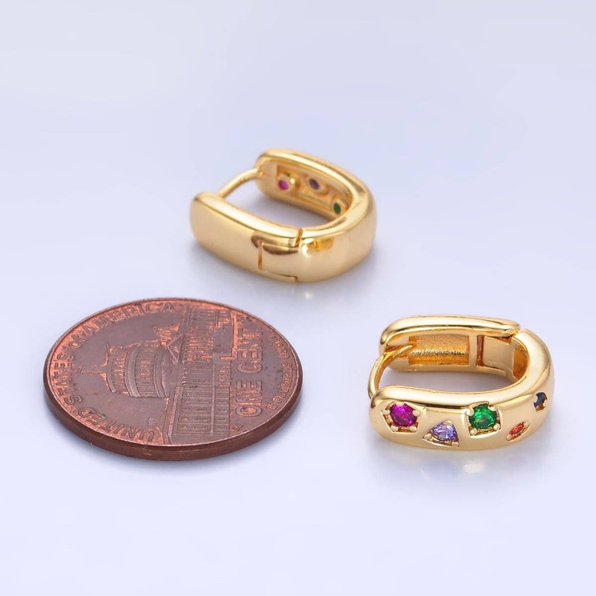 
                  
                    Gold Filled Multicolor Studded Huggies
                  
                